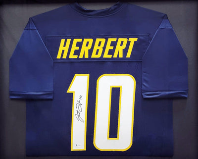 Los Angeles Chargers Justin Herbert Autographed Framed Blue Jersey Beckett BAS Stock #200923