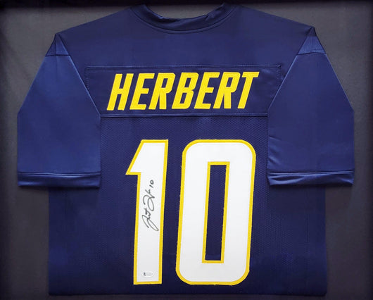 Los Angeles Chargers Justin Herbert Autographed Framed Blue Jersey Beckett BAS Stock #200923