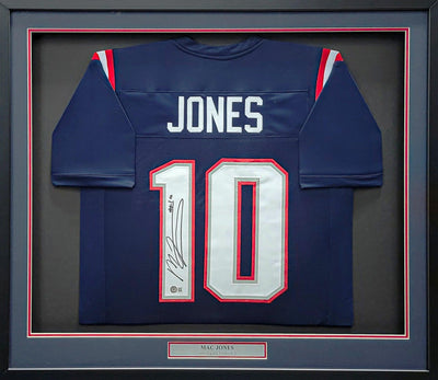 New England Patriots Mac Jones Autographed Framed Blue Jersey Beckett BAS QR Stock #202403