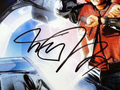 Michael J. Fox & Christopher Lloyd Autographed Back To The Future Part II 2 11x17 Movie Poster Beckett BAS Witness Stock #209149