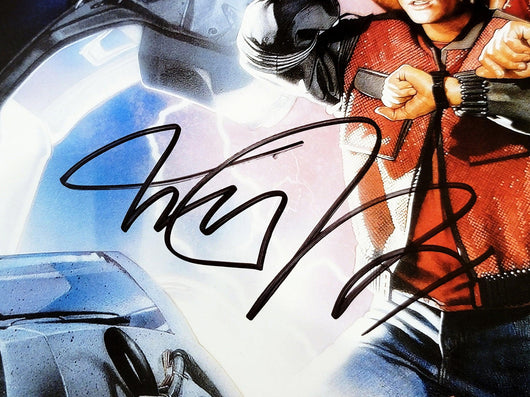 Michael J. Fox & Christopher Lloyd Autographed Back To The Future Part II 2 11x17 Movie Poster Beckett BAS Witness Stock #209149